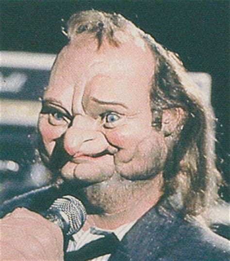 spitting image phil collins.